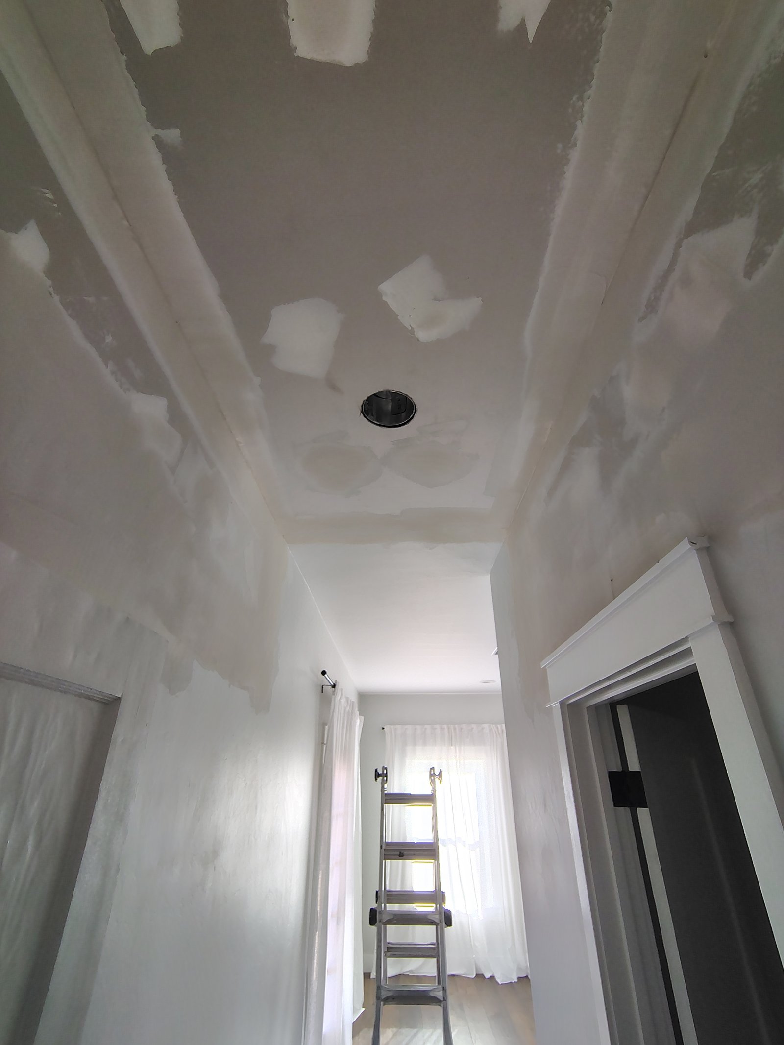 Hallway ceiling drywall repair skim coat Tucson AZ