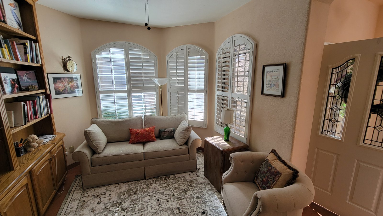 Plantation shutters installed on arched windows Tucson AZ